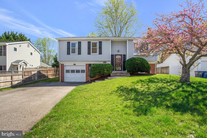 This beautifully maintained 4-bedroom, 2-bathroom home is nestled in a quiet, secure neighborhood on a no-outlet road—perfect for privacy and peace of mind. Step inside to discover an open floor plan with elegant molding in the dining and upstairs living spaces, creating a warm and inviting atmosphere.
The kitchen features a new floor and modern appliances, including a refrigerator installed in 2024, and a full suite of updated appliances. Outside, enjoy a spacious wooden deck, a fenced backyard, and a large yard framed by two blooming cherry blossom trees—ideal for gatherings or relaxing evenings at home.
Additional highlights include a driveway that fits two cars side by side, proximity to multiple grocery stores and schools, and walking paths less than a mile away.  With easy access to I-95, this home combines convenience, comfort, and charm in one perfect package