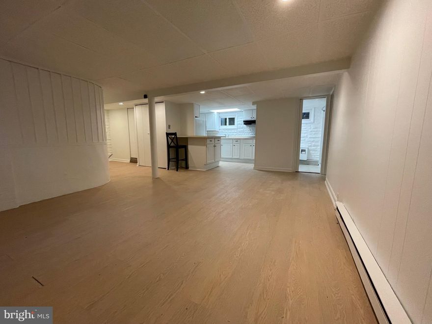 Basement apartment in 3 unit house.  Available NOW.  Freshly painted, new carpeting, recent LVT flooring, direct access to shared laundry room (free).  Water included, tenant pays electric.  One bedroom and open office/den, 2 walk-in closets.  Building has new water heater.  One parking space included.  Walk to bus stop, new Purple Line is a short distance away.  Owner/Agent.  Tenant pays for credit check $40.  No smoking or vaping, No Pets.