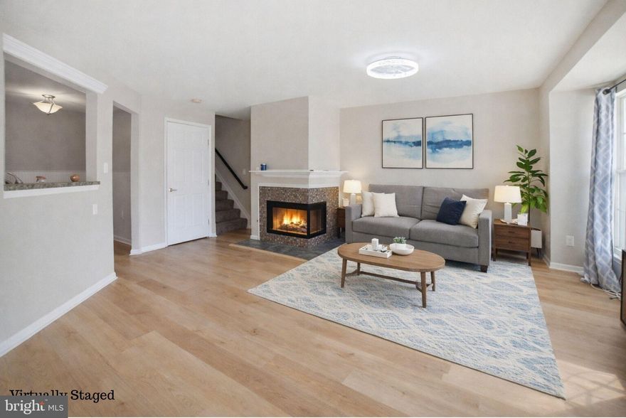 Rare 3-level townhome-style condo minutes from the Lorton VRE and I-95. Perfect for first-time home buyers, DC commuters or investors. This 3-bedroom home offers 1,533 sq ft, updated flooring, stainless appliances, and a cozy gas fireplace. The top-level provides flexible space for a home office. Community amenities include pool, fitness center, and maintained grounds. Estimated rental potential $2,600–$2,850/month.