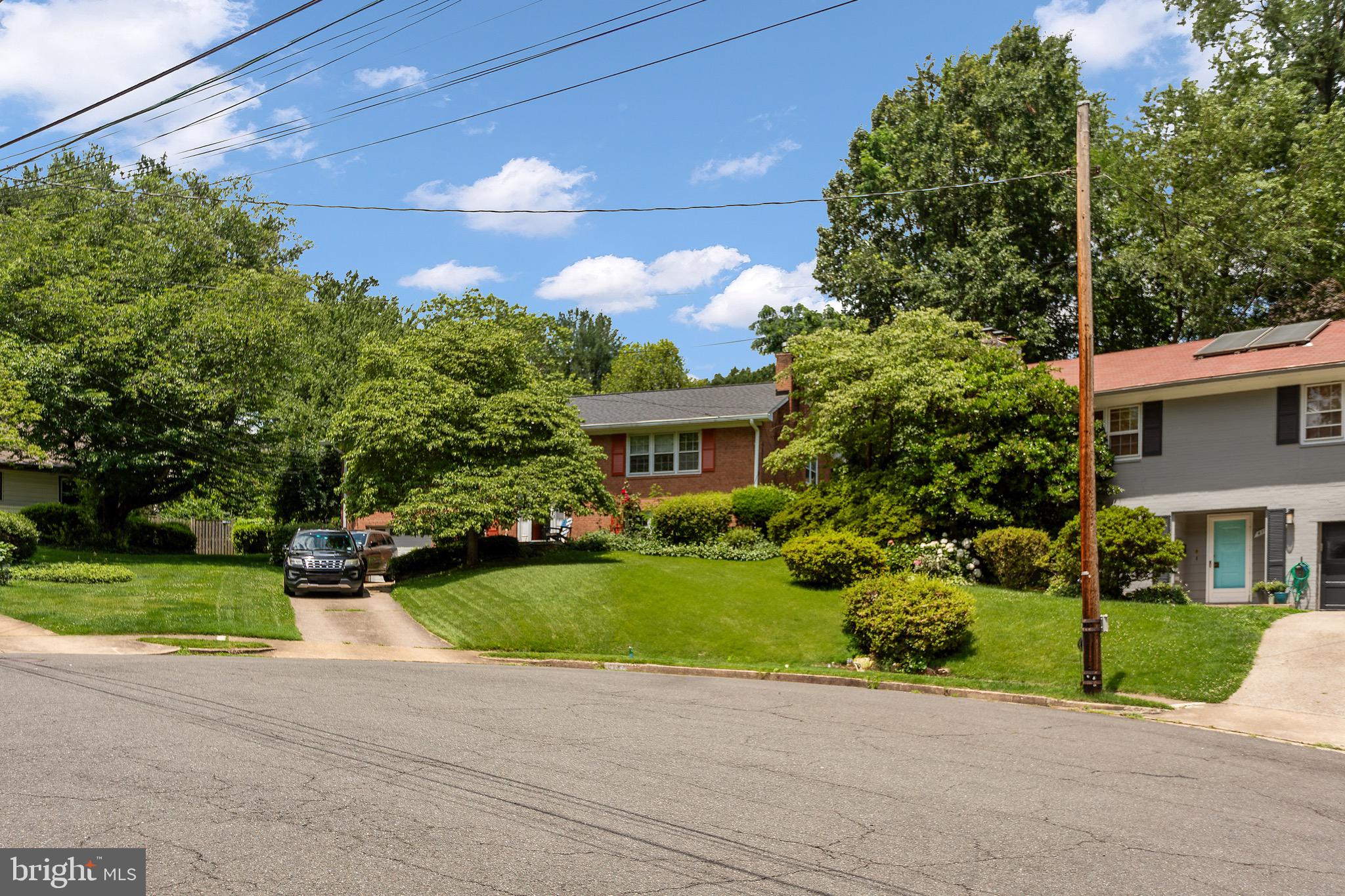 Welcome to an incredible opportunity in one of Arlington’s most sought-after neighborhoods! Tucked away on a quiet cul-de-sac just off Military Road, this charming home offers unbeatable access to DC, Cherrydale shops and dining, multiple Metro stations, parks, and some of Arlington’s top-rated schools—Taylor Elementary, Hamm Middle, and Yorktown High.
Step inside to find fresh interior paint and a beautifully bright layout featuring hardwood floors throughout the upper level. The updated kitchen includes modern appliances, and the versatile lower-level bedroom or den boasts brand-new carpet and its own cozy vibe, perfect for guests or a home office. Enjoy a private en-suite bath in the primary bedroom, two fireplaces (one on each level), and multiple light-filled living areas ideal for both relaxing and entertaining.
The fully fenced yard offers room to play, garden, or simply unwind, while the spacious family and living rooms provide flexibility for everyday living.
Showings by appointment only. Don’t miss your chance to own this hidden gem in a prime location!
Move In Ready!