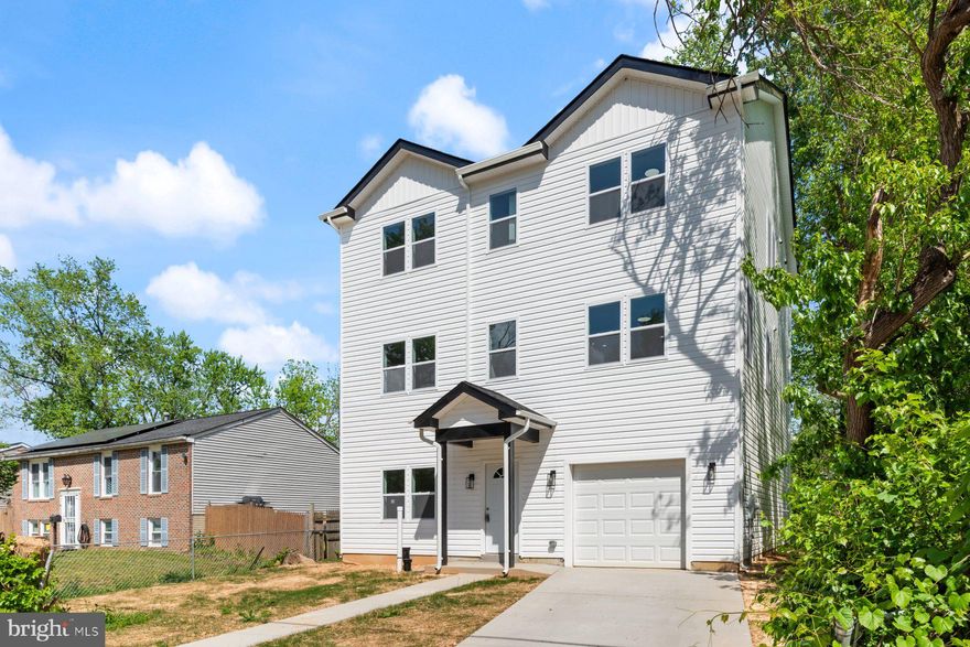 Welcome to this stunning, brand-new home in Capitol Heights! This impressive three-level building boasts plenty of space and modern amenities. The first level features a spacious family room, a bedroom or office, and a full bathroom, with convenient access from the garage and backyard. The second floor showcases a gourmet kitchen perfect for cooking and entertaining, with ample cabinetry, and granite countertops.   The adjacent dining room and huge family room are ideal for gatherings. A multi-purpose room and half bathroom complete this level. The top floor boasts a luxurious master suite with a walk-in closet and master bath featuring an old-fashioned bathtub, double sinks, and a spacious shower area. Three additional bedrooms and a full bathroom provide ample space for family and friends. With its prime location near local highways, shopping, and restaurants, and close proximity to DC, this home is a rare find. Schedule a viewing today and make it yours!