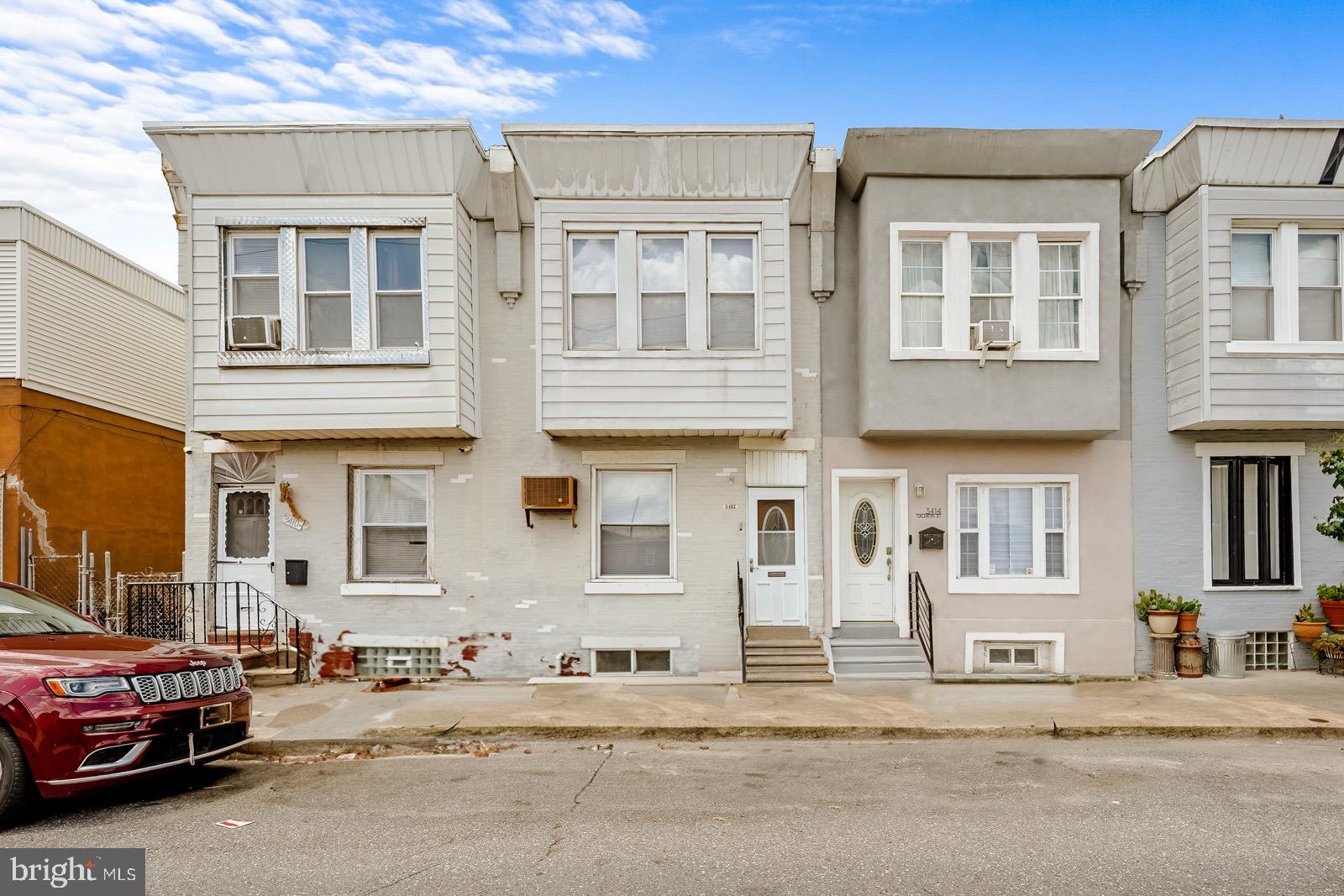 Updated Brick row on desirable Port Richmond Block. Enter thru the enclosed foyer which opens into the open living room with wall to wall carpets and ceiling fan. Living room opens into the dining area with wall to wall carpets and ceiling fan. Updated Kitchen with Granite counters, Ceramic tile back splash and hardwood floor. The Kitchen is equipped with Stainless steel Gas range, built in microwave, dishwasher and refrigerator. Kitchen has outside exit to fenced rear. Rear of building has newer vinyl siding. 2 nd floor has 3 nice sized bedrooms all with ceilings fans. The hall bath has been completely remodeled with new ceramic tile floor and shower, vanity and toilet. Full basement with plenty of storage and laundry area. This property has all newer windows, New front and back exterior doors and updated Electric service. Newer heater and central air unit plus six panel doors thru out and one year home warranty. Come see this gem in booming Port Richmond Neighborhood.