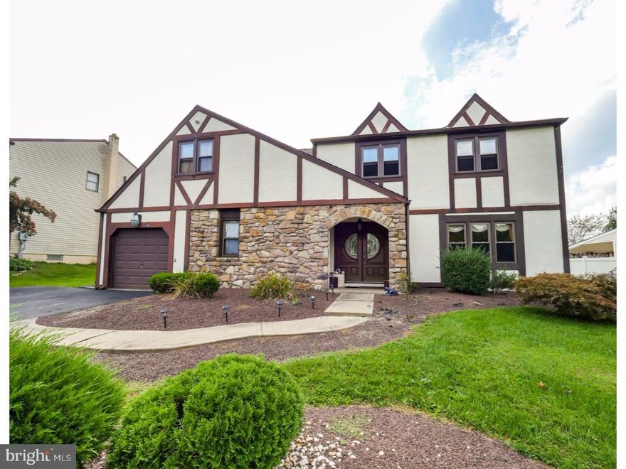 Beautiful 4 bedroom 3.5 bath home completely remodeled with foyer entrance, hardwood floors throughout, recess lighting, custom doors and wrought-iron railing on the staircase. Gourmet eat-in kitchen with bay window, built-in wine cabinet, stainless steel appliances and granite counter tops.  Extended family room with wood-burning fireplace and a door that leads to a very large fenced-in backyard with it's own garden. Formal living room, dining room, powder room and laundry room complete the first floor. Second floor has master suite with vaulted ceiling and skylight, two closets and master bath with whirlpool tub. Three more spacious bedrooms, one with it's own bath and a hall bath complete the second floor. Well maintained landscaping surrounds this move-in-ready home. Easy access to all major roads, trains to NY and Philly, shopping and restaurants.  Award Winning Council Rock Schools.