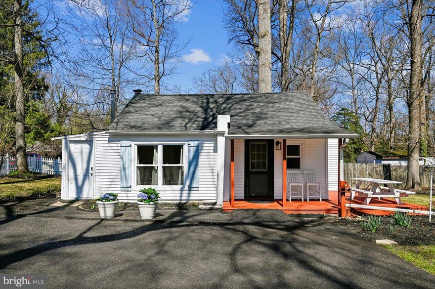 Welcome to Herald Harbor living! Nestled in the sought after water oriented community of Herald Harbor, this charming cottage offers an inviting home in comfort and convenience. Energy efficient Bosch Ductless Minisplit and newer double pane windows.  Large driveway for 4 cars. Enjoy the spacious yard with beautiful trees and landscaping in quiet surroundings, easily walkable to the community beach and boat/kayak launch.
Community  public park with tennis, basketball court, and playground.   Enjoy events, festivals, restaurants, boat show in nearby Annapolis. Also, minutes from Bean Rush Cafe, bike and walking trails.  No HOA, has voluntary association for beach/boat launch privileges.  Easy commute to Annapolis, Columbia, DC and Baltimore.  Could be full time home, weekend get-a way,  or AIRBNB investment. Owner is agent.