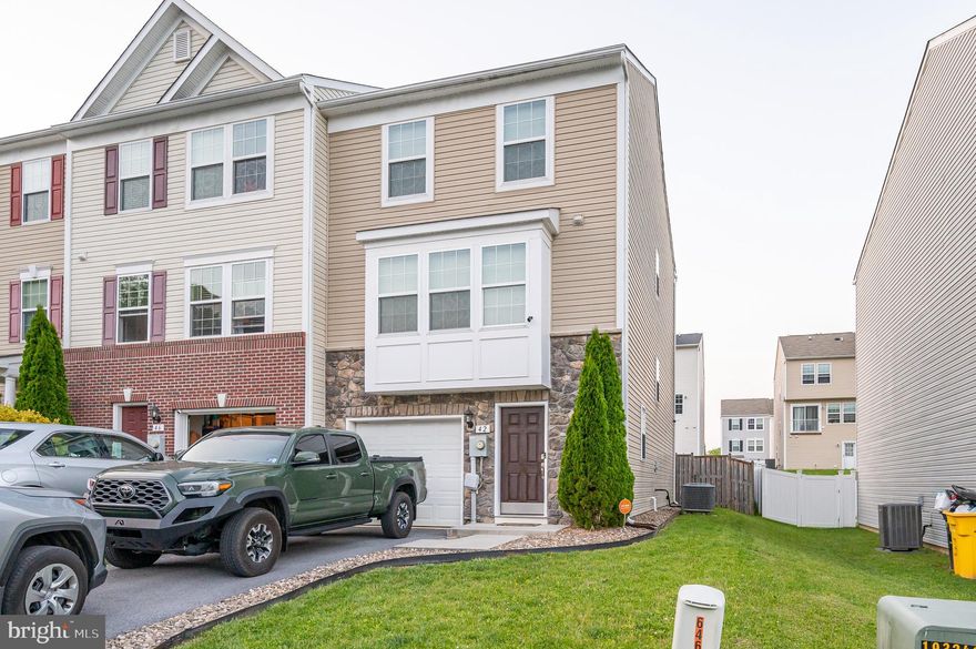 This lovely 3 bedroom end unit has been wonderfully maintained! The foyer features vinyl floors and a large guest closet. There is direct access to the 1 car garage. Down the hall you have a huge, carpeted rec room. There are so many potential uses for this extra living space! It features a large laundry closet with plenty of shelving storage. Your rear yard access is here as well. There is already a rough in for a 1/2 bath. The hard stuff is done for you! Upstairs we have a spacious living room with lots of natural light, ceiling fan, and carpet. There is a 1/2 bath, great for guests. There is a passthrough to the kitchen. Here you have vinyl floors, double sink, and 42 in cabinetry. The island provides breakfast bar seating for two. The kitchen is open to the dining area with vinyl floors. There is plenty of space to host dinners! Especially since the kitchen and dining are open to the huge morning room! This is a great set up for entertaining. The morning room features vinyl floors, tons of natural light and a large closet! Upstairs you have two generously sized bedrooms with carpet and overhead light. The hall bath features a three foot single bowl vanity, vinyl floors, and tub/shower. The primary suite is truly large with carpet and a ceiling fan. It includes a massive walk-in closet and private ensuite bathroom. Here you have a double bowl vanity, stall shower and soaking tub with tile surround. You'll want for nothing in this space. Outside you have a large, lush, and level rear yard. The yard is fully fenced with a gate at the front for easy street access when needed. The yard also includes a nice firepit - great for smores! This home has everything you want and more! Come see it today!