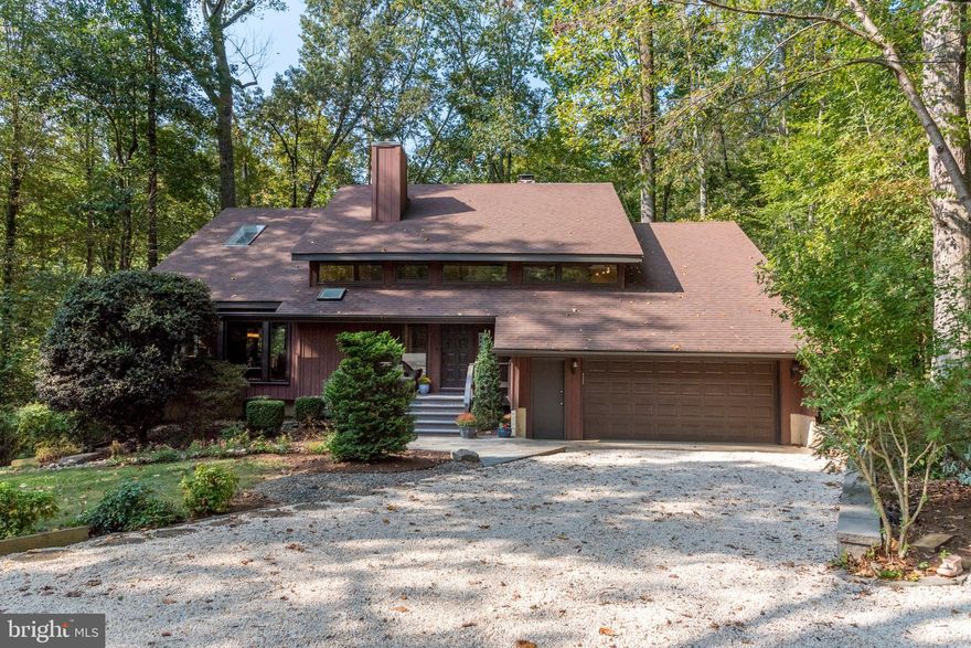 Absolutely no need to look any further! Welcome to the ultimate custom contemporary! Beautifully updated & maintained.  One of the prettiest lots in the desirable waterfront community of Saefern. Ideally sited on a very quiet cul-de-sac. Lovely level front yard & driveway into the oversized 2 car garage.  "Spacious" is an understatement.  The perfect home for entertaining year round.  Gorgeous privacy off large rear deck overlooking woods & wildlife. Mastersuite set off on it's own level, separate from the other bedrooms. Walkout lower level offers the 5th bedroom & additional "party" kitchen...ideal space for possible "in-law"/nanny suite Most importantly, Saefern Homeowners' Association is VOLUNTARY, but with membership every homeowner is entitled to a boat slip, pool, tennis/pickleball courts, stable!  Please check out www.Saefern.org for all the community information & membership details.  Saefern is located conveniently to all major commuting roads, the Westfield Mall & downtown Historic Annapolis, City Dock & the US Naval Academy.  WHEN SHOWING, PLEASE REMOVE SHOES OR PUT ON BOOTIES IN BASKET BY FRONT DOOR.