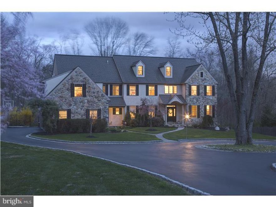This exquisitely renovated custom Colonial located in prestigious Easttown Township sits on 1.9 beautiful sunlit acres w/backdrop of natural woodlands. As you enter the property through stone pillars, the circular granite-accented drive introduces you to the attention to detail that will delight you throughout this gorgeous home. D cor inspired by renowned interior designer Charles Faudree, the furnishings and antiques are an added treat. Features include 9 foot ceilings, site finished hardwood, custom millwork, front to back foyer highlighted by turned staircase w/triple window landing. A dazzling family room wall of windows w/vaulted ceiling and gas fireplace opens to the spectacular dream of a kitchen that would wow any gourmet chef! Custom glazed Coventry cabinetry hosts the magnificent Carrera marble center island while Taupe granite compliments the perimeter of the cabinetry, all accented by Bouvet hand forged hardware. Equipped w/Thermador Professional appliances, side by side Subzero integrated Refrigerator/Freezer, and dramatic handcrafted copper mantel vent hood. Shaw farmhouse sink, topped by Rohl faucet & filtered water dispenser, and so much more!  Kitchen & Family Room open to new Trex deck, perfect flow for entertaining. Living Room w/marble surround fireplace, Dining Room, Study and 2 half baths complete the Main level. All interior doors were replaced w/solid wood two panel doors and lovely Bouvet hardware. A true 5 bedroom, 4 bath home, all on the Upper level. Step into the gorgeous double door Master Suite w/separate hardwood sitting room and spacious bedroom, ensuite Master Bath renovated w/custom  his/her vanities, whirlpool surround, Travertine & Empiridor marble & steam shower w/frameless glass door. All baths were renovated w/Coventry vanities, Rohl faucets, travertine vanity tops and floors, rebuilt showers and frameless shower doors. Two bedrooms have ensuite baths, 2 others share a bath. All this and a stunning daylight walk-out Lower level w/large entertaining area, bar & wine cellar, media room, billiard area, office and exercise room. Lower level has French doors to paver patio. Current homeowners selected only the finest quality products and materials and combined w/impeccable taste have created a treasure of a home for the next lucky people.  Ideally located in award winning T/E School District, the home is convenient to all major highways, the R5, shops, dining and recreation. A pleasure to show, a treasure to own!