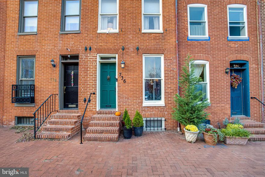 Welcome to 736 McHenry st! This Beautifully updated three bedroom  one and a half bathroom townhome in Barre Circle is sure to check every box off your buyers list. This home is situated on a quiet tree-lined, one way street that offers an abundant amount of parking. The main level features  gleaming hardwood floors throughout and a wood burning fireplace in the large dining room, updated kitchen with quartz counter tops, tile backsplash and a breakfast bar open to the spacious living room. The rear courtyard is an excellent space for entertaining and allows for easy access to a large open green space/park. The second level is comprised of two large bedrooms and a full bathroom. The full bathroom  shower was just redone and plumbing updated. The entire third level is the master bedroom with a lovely sitting area and deck that overlooks the park. The laundry, as well as  plenty of storage are located in the unfinished basement. This location provides easy access to University of Maryland hospital, Downtown, Stadiums, MARC & light rail trains, I-295 and I-95.   Stop by the Open House Sunday 11/15 1-3pm! Please follow Covid Guidelines!