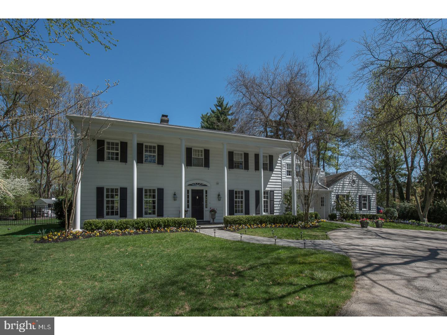 A Long private drive leads to this beautiful, secluded, picturesque home in the most desirable sections of Gladwyne. The home has been beautifully decorated and is wonderful for living and entertaining. The main floor features a main entrance to a large foyer with coat closets and powder room; a large elegant living room; formal dining room with French doors; stunning family room with stone fireplace, wet bar and sliding glass doors to the patios and outdoor entertaining areas; large chef's kitchen with breakfast room, marble counters and gas cooking; mudroom; laundry room and back stairs to 2nd floor. The second floor features 4 bedrooms each with a private bathroom. The owner suite is stunning with a tray ceiling with cove lighting and a walk-in closet/dressing room that is a fashionista's dream; the beautiful custom finished marble bathroom has an air jet tub for 2, double sinks with vanities and a private commode. The basement is finished with a recreational/media area. The grounds are gorgeous with a fabulous outdoor entertaining center, complete with a fireplace and kitchen; heated pool with new tile, decking and a new heater; plus a pool house with half bath and storage. This home is in walking distance to the village of Gladwyne, in the award winning Lower Merion School district.