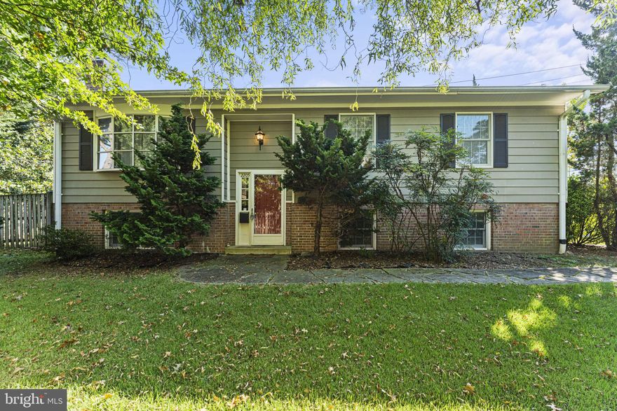 Welcome home to this private 2-level, 3 bedroom and 2 full bathroom home! Driveway parking for two cars and a walkway to the front entrance is very inviting. Foyer entry with access to either of the two fully finished levels. This home is approximately 2,000sf and gets loads of natural sunlight. Hardwood floors on the main level shine and show off the open concept living area. An eat-in kitchen, including bar seating at the counter has plenty of cabinet and counter space for cooking. Sliding glass doors lead out to the back deck and private backyard, including a patio and plenty of grass. Two large bedrooms on the upper level share a hall bathroom. The lower level has another large rec room with fireplace. A large third bedroom has an en-suite bathroom and gets lots of sunlight as well. The laundry and utility area on the lower level double as abundant storage space. This location is unparalleled, extremely close to two Metro stops, half a block to a number of local restaurants, zero traffic lights into DC and close to Amazon's new HQ2 @ National Landing.