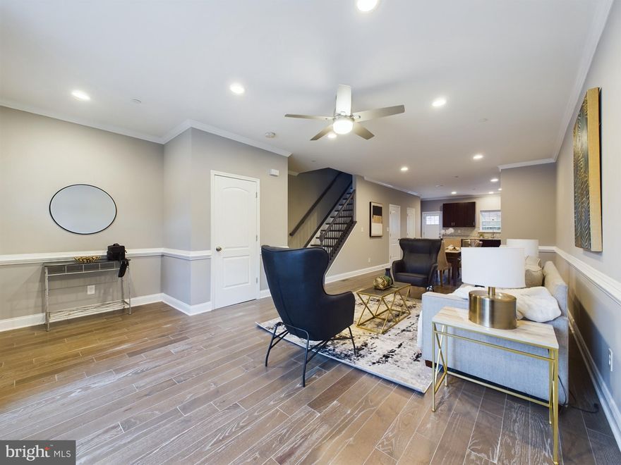 Introducing to the market, 1519 E. Chase Street, meticulously curated and available exclusively through Realty ONE Group Excellence. This exquisite New Construction Townhome offers a unique opportunity to indulge in four levels of opulent living.

Upon entering the main level, prepare to be captivated by the expansive open floor plan, epitomizing an ultra-modern lifestyle. Immerse yourself in the luxury of hardwood floors, complemented by a chic half bath and a kitchen adorned with a four-piece Profile appliance package and granite counters. This culinary haven extends seamlessly to a deck, perfect for both relaxation and entertainment.

Ascend to the second level, where two private bedrooms await, each appointed with ceiling fans, walk-in closets, and recessed lighting. Embrace the epitome of comfort, as each bedroom boasts its own private full bathroom. The second level also houses a dedicated laundry area equipped with front-loading washer and dryer.

The third level is a sanctuary of indulgence, featuring a primary bedroom with a full bath, walk-in closet, plush carpeting, and ambient recessed lighting. A thoughtfully designed lounge area opens onto a private deck, offering panoramic views of the city skyline.

The lower level invites you into an expansive open floor plan, complete with another half bath, recessed lighting, and sleek ceramic tile. This space seamlessly transitions to a private patio, providing an exclusive retreat for relaxation.

Parking is effortlessly accommodated with the inclusion of a detached garage, ensuring both convenience and security. Seize the opportunity to make this newly constructed home yours, strategically situated in close proximity to shopping, schools, restaurants, and entertainment. Enjoy swift access to Harbor East, Canton, Inner Harbor, and local venues, making every aspect of urban living effortlessly accessible. Elevate your lifestyle with this extraordinary residence that effortlessly combines luxury, functionality, and a coveted location.
