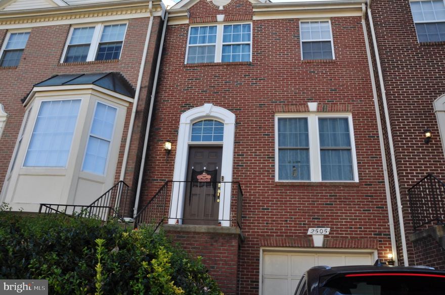 3 level, 3 bedroom, 3 1/2 bath  brick townhome located in the McNair Farms subdivision. Within 5 miles of the metro station. Minutes from the town center, toll road, 28 and 50. Carpet allowance of $4000.00 will be given to new owner to pick out the color they want with a full price offer. Needs some TLC but priced to sell offering a great location and layout. Lower level offers a den that is currently being used a bedroom, Family Room, Full Bath and access to patio and garage. Laundry on the lower level. Middle level offers a formal living room and dining room with a half bath by the front entrance. Family room with gas fireplace opens into the kitchen. Computer area to work from home or can have a sitting area in the kitchen. The deck overlooks the playground perfect for kids. Hardwood floors throughout this level. Upper level offers a huge Master Bedroom with 2 closets and a Master Bathroom with a jacuzzi tub, walk in shower and double sink vanity with a separate water closet. Hurry before the mortgage rates increase and makes this your home.