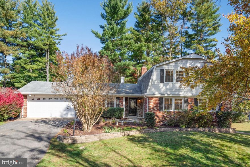 **Seller received compelling sight-unseen offer  and chose to accept it.**  Live LARGE in this spacious 4 bed/2 den/4 bath home on 3 roomy levels in a lush, quiet neighborhood. Large attached 2-car garage with combo laundry & mud room that leads into the house. New neutral paint. Newly refinished wood floors in all bedrooms, 1st and 2nd floor hallways and family room. New carpet on the lower level. Brand new fridge and washing machine. HVAC: 2017. Huge living room features attractive wood floors. Sparkling chandelier in dining room.  Let the dog and your gardening imagination run wild in the large fenced backyard (.29 acre lot), complete with a beautiful and sizable stone patio. Estate sale, as is. While every effort will be made to hold both open houses and set an advertised deadline for offers, seller reserves the right to accept an offer at any time.