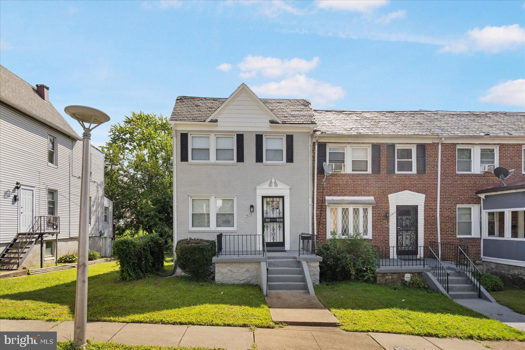 No attention to detail was missed during the transformation of this stunning 4BR/2BA end of row Townhome located on a quiet street in Pen Lucy. Make your way to the front door and step into a home boasting tons of light, luxury flooring, elegant lighting fixtures, recessed lighting, and the open main floor plan homeowners are seeking. The main floor living space consists of a large living room with a bold custom feature wall, a spacious dining area, and a stunning kitchen. The kitchen not only features mixed metals such as gold and stainless, but also features two-tone cabinets in white and bold blue. In addition, there are stainless steel appliances including a slide-in gas range, sleek quartz countertops with a complimenting tiled backsplash, and an island with a stainless sink, pendant lights, and breakfast seating for three. On the second floor are two sizable secondary bedrooms, a spacious primary bedroom, and a newly renovated full bath. The lower level boasts additiional living space hosting the fourth bedroom, a full bath with a walk-in shower, laundry, storage, a sizable family room, and a walk-out to the fenced yard. From the kitchen step outside onto a covered, newly constructed, wood deck that leads to a yard with green space, a detached garage, and so many possibilities. This home is move-in ready with so much to offer new homeowners, and is conveniently located in proximity to shopping, restaurants, and commuter routes.