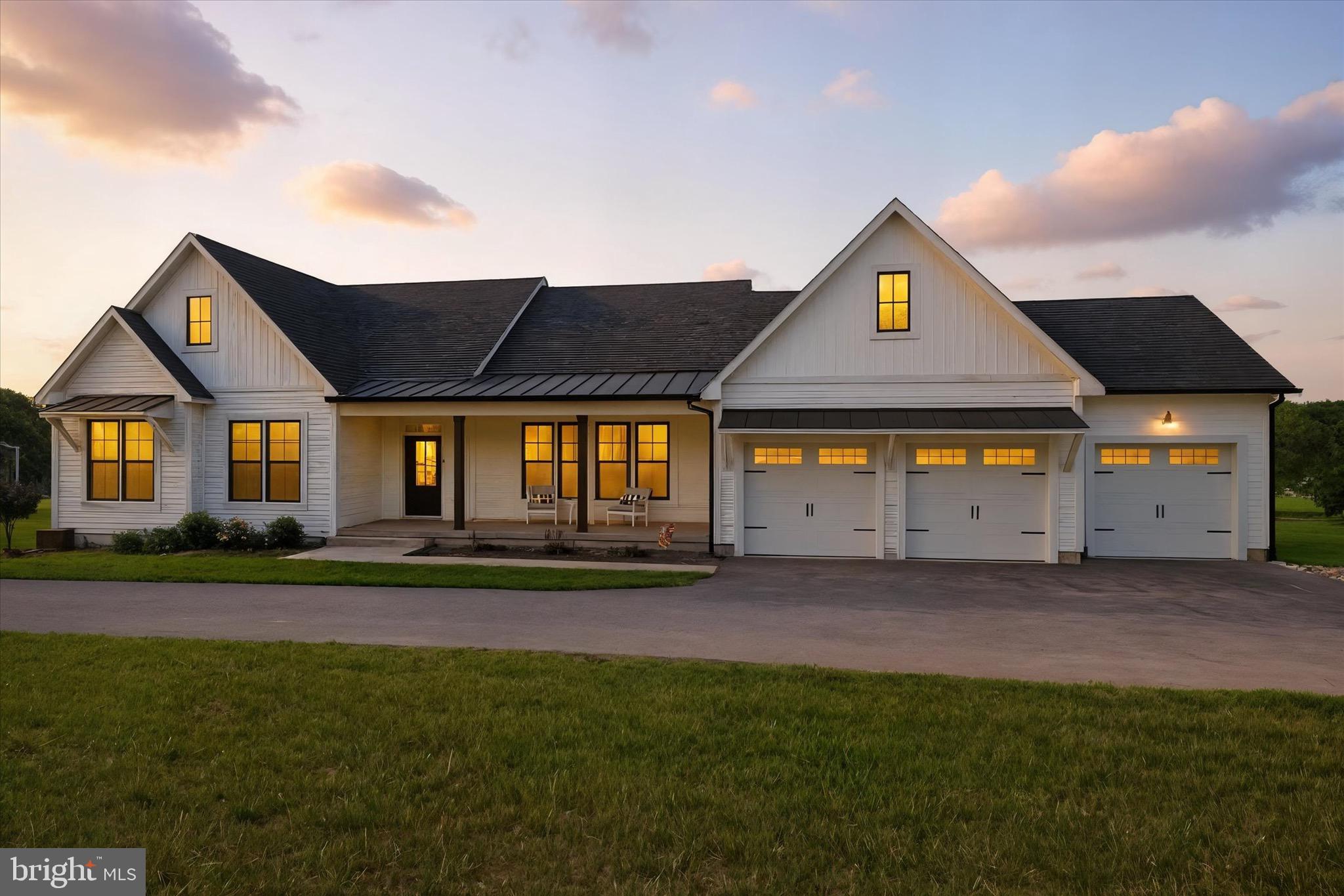 Experience luxury living in this stunning award-winning MD builder, Greenspring Homes custom-built rancher, perfectly situated on 3 acres with breathtaking views in the exclusive Rose Acres subdivision with no HOA. Located on a peaceful, quiet street with only six homes, this multi-generational property offers ultimate privacy while maintaining convenient commuter access. The expansive screened deck features a ceiling fan, recessed lighting, and retractable shades—ideal for year-round entertaining.
This thoughtfully designed home offers two primary owner suites—one on the main level and another on the lower level. Both feature spa-like bathrooms with dual vanities, gorgeous tile surrounds, and double handheld shower systems. Two additional large bedrooms provide ample space for family and guests.
The heart of the home showcases a wide-open gourmet kitchen equipped with Whirlpool appliances, flowing seamlessly into the dining area and family room. Soaring vaulted ceilings, custom lighting, and beautiful ceiling fans create an atmosphere of elegance and comfort.
Built just six years ago, this home features hand-scraped prefinished flooring, radiant heat in downstairs primary bath, custom-built doors, and unique finishes throughout. Every detail reflects quality craftsmanship and attention to design.
The professionally designed landscaping and extensive hardscaping create multiple outdoor living spaces:
• Hot tub on the patio beneath the deck with cozy seating area
• Flagstone patio with circular fire pit
• Spectacular sunset views that will take your breath away
An oversized three-car garage includes a dedicated workshop area, while the lower level offers a massive storage room for all your needs.
This is more than a home—it’s a lifestyle.
Sellers are having a home built and will need to rent back until the end of December.