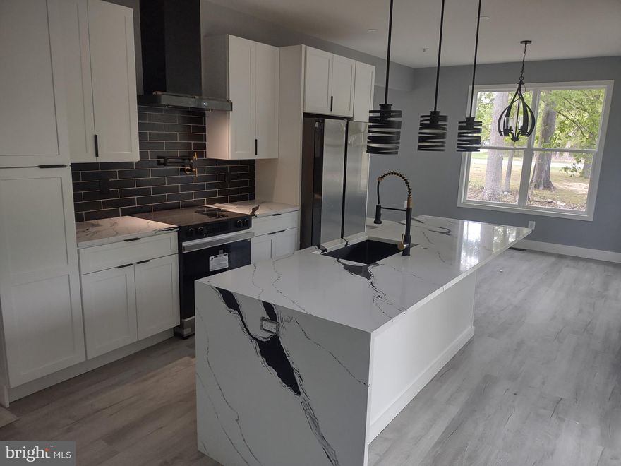 New construction to be built just in time for the new year expected completion end of June 2025.   We are about 90% complete.  Custom Bryans Road is a small town located in the southern part of Maryland, USA. Situated along the Potomac River, it is a scenic and quaint community with a rich history and interesting facts. Let's, dive in, JKRRLLC Home Builders is a Unique custom builder that provides a home that is catered to support the style and comfort of great Suburban Living.  JKRRLLC is proud to present this wonderful three -story, single-family custom build home currently in the final stages of completion.  The home features 5 bedrooms and 3.5 bathrooms, along with a spacious 2-car garage.  This elegant custom home floorplan is designed to accommodate space and luxury under one roof, offering a harmonious blend of privacy and shared living spaces. There are 5 bedrooms on the second level accommodating large families.  The large laundry room is also on the second level as a convenience for family access.  The main level living spaces are perfect for providing family activities or relaxation. The primary bedroom also located on the second floor is accompanied by a large walk-in closet and a luxurious on-suite bathroom.  The basement is fully finished for accommodated a media room and additional multiple uses.  the lot is surrounded by matured trees for that wonderful country feel.  This custom home has what most people love and that is a covered porch for relaxing and sharing great moments with family and friends.  Here are some of the Architectual features being provided.  MI 3500 series is MI’s flagship line of windows, made from premium vinyl. This series comes in double hung, slider, picture, bay, bow, garden, and specialty shapes. The vinyl frame and sashes contain insulating foam for increased efficiency. GAF Timberline NS natural shadow lifetime Architectual shingles, Blow in insulation, sprayed insulation through the house and foam insulation around the door and windows for great energy savings. Custom appliance package and so much more. Folks this is going to be a great home for the price built with pride and quality craftsmanship and materials. Please feel free to contact Stew Tellechea with Re/max Realty Group with any questions about this wonderful Custom Charmer.