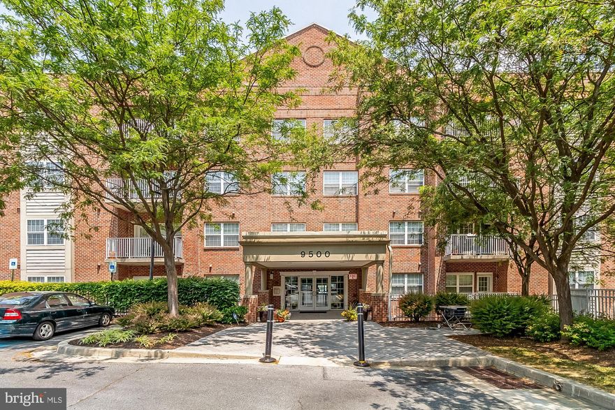 Spacious light filled top floor 2BR/2BA condo with assigned garage parking space in the heart of Owings Mills. The entry foyer flows into an enormous living/dining room. Large eat-in kitchen with gas cooktop opens to a large family room with a private balcony and gas fireplace. A bonus room off the kitchen leads to a separate laundry room and can serve as an office, mudroom, or walk in pantry. Unit has ample closet space. Mid-rise, secure, elevator building in a gated community.  Owings Mills New Town Community Association provides access to the community pool. Close to dining, shopping, entertainment, and everything in Owings Mills.