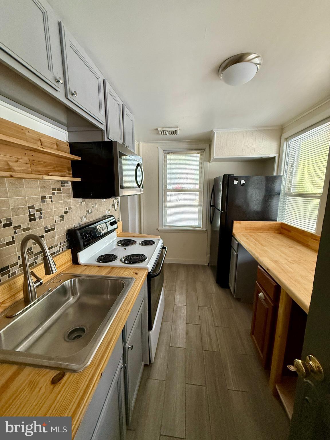 Welcome to 910 E Baltimore Pike – a beautifully maintained and updated apartment located right on Route 1 in Kennett Square. This spacious 3 bedroom, 1 full and 1 half bathroom rental offers comfort, convenience, and charm all in one. Step inside to find gorgeous hardwood floors throughout the majority of the home and newly renovated bathrooms that bring a fresh, modern feel to the home. The new central air system ensures year-round comfort, and electricity is included in the rent – a major cost-saver, potentially reducing your monthly expenses by $200–$500. The rental features three bedrooms, one full bathroom, and one half bathroom. A washer and dryer are located in the basement for added convenience. Water is billed quarterly, and tenants are responsible for all other utilities. Please note that there is no dishwasher in the unit. This location offers unbeatable convenience—just minutes from the Kennett Square Borough, Longwood Gardens, and a variety of shops, restaurants, and entertainment options. With easy access to Route 1 and surrounding areas, you’ll enjoy a connected and vibrant lifestyle. Pets are considered on a case-by-case basis with a $500 non-refundable deposit. Vaccination records and photos will be required. Contact us today to schedule a tour and experience the ease and comfort of living in Kennett Square!