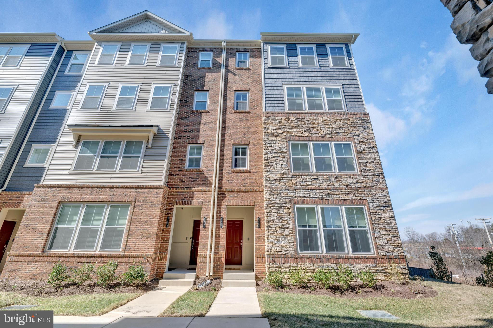 Welcome home to this luxury, like new two-level condo where you can lease with the option to purchase! This stunning end unit top-floor condo with an attached garage features top-of-the-line manufactured flooring, upgraded cabinets, stainless still appliances, modern fixtures, Corian countertops, tall ceilings, with floor-to-ceiling windows for tons of natural light, neutral decor, an oversized executive suite with a spacious ensuite, large walk-in closets, large secondary bedrooms, state of a state-of-the-art washer and dryer, and a deck off the main living area, all in gorgeous community with sidewalks and curves, community center, gym, pool and so much more.