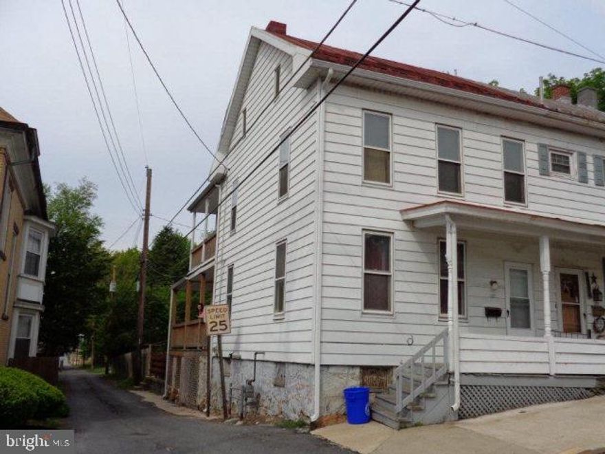 Newer gas hot water furnace, 3 porches. Attic has lots of room and well insulated.