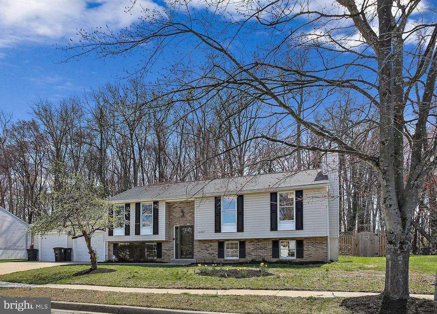 Welcome to this charming four-bedroom, three-bath home in move-in condition, offering the perfect blend of comfort, style, and convenience. Remodeled baths, new roof, new HVAC, new deck, LVP flooring on the upper level- just a few of the many updates throughout. Spacious living room, dining room and eat-in kitchen. Lower-level family room with a woodburning fireplace, an additional bedroom and full bathroom. Attached two car garage with newly poured concrete flooring. A fenced backyard backing to a wooded area provides the perfect space for outdoor entertaining, gardening, or simply unwinding amidst nature. Nestled in a quiet community with easy access to I-95 and only 4 miles from National Harbor, this home offers unparalleled convenience to shopping and dining while providing a serene living environment.