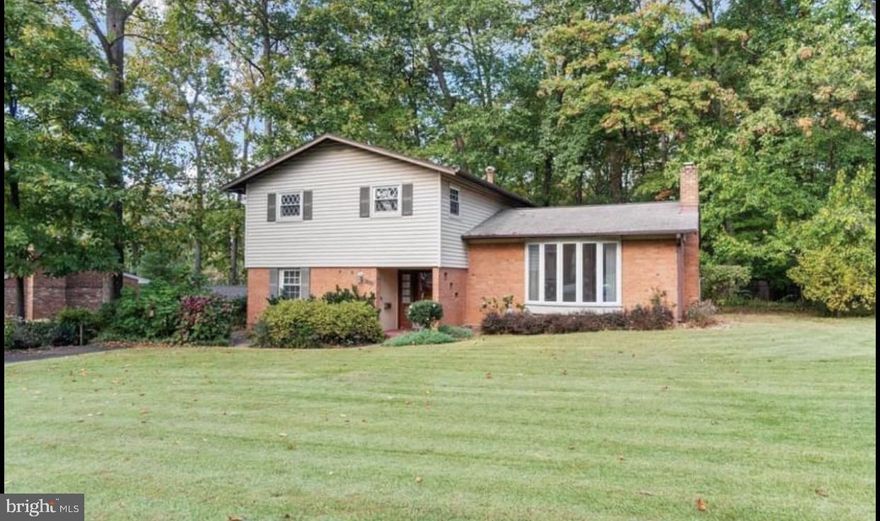 Great Location inside the beltway. This newly renovated sun-filled home features an open concept and is beautifully designed for modern living, and LVP floors throughout.
Main level offers a gorgeous formal living room with a brick fireplace, elegantly appointed dining room, a beautifully extended open kitchen w/granite countertops, a large island. 
Also includes a separate entertaining area open to a screened porch Main level also includes one small bedroom with sliding doors that could be used as study, family room or a bedroom. with bathroom, and 3 additional bedrooms on second level. a full bath in the upper hallway. a laundry room and a generous sized wood deck with stairs leading to a beautiful private and peaceful backyard with mature trees and a well-manicured landscape.