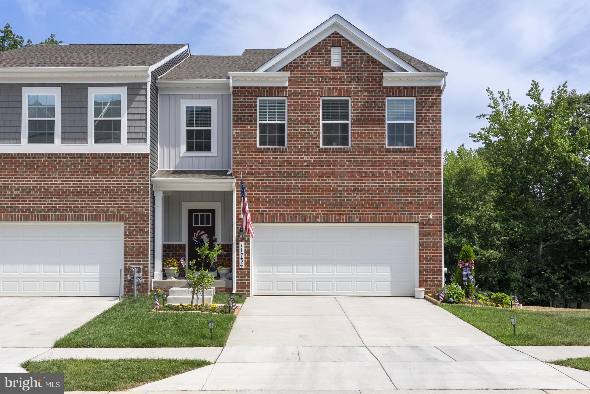 Built in 2024 and thoughtfully upgraded since, this premium end-unit 4BR townhome is ideally positioned within the community, backing to a serene wooded view, and offers exceptional space and flow with over 2,800 square feet across three finished levels.
The main floor begins with a welcoming foyer that opens to a coat closet, powder room, and 2 car garage access. Down the hall, an open-concept layout connects the dining area, living room, and kitchen, ideal for both daily living and entertaining. The kitchen features light quartz countertops, a gas stove, stainless steel appliances, a white herringbone backsplash, owner updated premium bronze hardware and faucet, and a closed pantry. Off the kitchen, step out onto the back deck and enjoy peaceful wooded views.
Upstairs, you'll find four spacious bedrooms, including a primary bedroom with en-suite bathroom including a double vanity and a large walk-in closet. The upper level also includes a full hall bath and a dedicated laundry room with a brand-new washer and dryer.
The finished walkout basement includes a large gathering room, storage under the stairs, a separate storage room, and a flex space that can easily be finished to create a fifth bedroom with rough-in plumbing already in place, allowing for the addition of a full bathroom alongside it.
Thoughtful updates include new light fixtures throughout, designer wall molding on the main level, and an upgraded faucet in the powder room. A lemon tree in the front yard adds curb appeal and character.
Ideally located for commuters, this home offers quick access to I-495 and Route 50, with New Carrollton Station just 6.5 miles away. Fort Meade, Washington D.C., Annapolis, and Baltimore are all within easy reach, making this a smart choice for those who value both style and convenience.
Move-in ready and full of modern touches, this home is ready to welcome you!