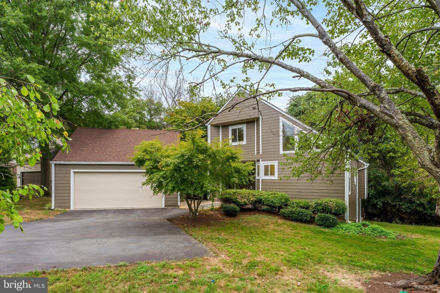 AVAILABLE FOR IMMEDIATE MOVE IN! Light-filled contemporary North Reston home backing to trees and adjacent to open common area. Main level features soaring ceilings, hardwood flooring throughout living area, 2 bedrooms, and 1 full bath. SGD with access to private rear deck overlooking trees. Upper level offers spacious primary suite with full bath and bonus loft area. Walk out lower level with spacious rec room and huge storage area. Detached 2 car garage with ample storage space. PETS CASE BY CASE, NO SMOKING.