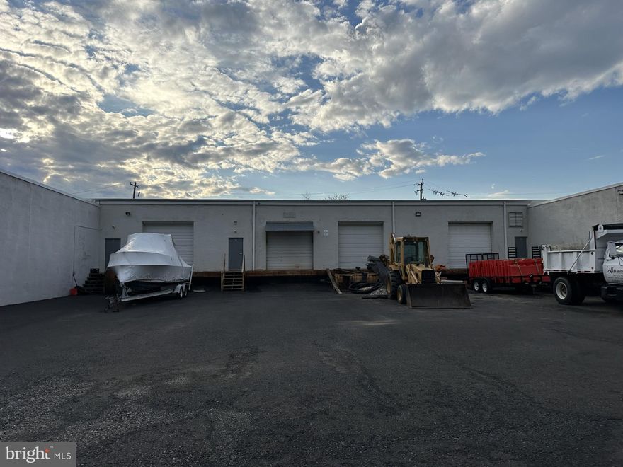 Paul Valley Industrial Park,  located between County Line Rd. and Street Rd. off Valley Ave.  Industrial Unit with 4,000 sq ft of warehouse type space.  Two 300 sq ft offices, a powder room compliment the large space Ideal for shipping, storage, contractor's warehouse with 15' height ceilings.  Loading dock with overhead 12' door on the front of the unit.  To the rear is a tall 15' garage door at ground level which will allow for equipment  and vehicle entry.   Perfect for landscaping  or hardscaping outfit or anything requiring inventory with a shipping and receiving operation.  Rent is a total of $17.25 per sq. ft per year. Minimum of 2 year lease required.  No machine shop or auto use will be permitted or any use involving hazardous substances.