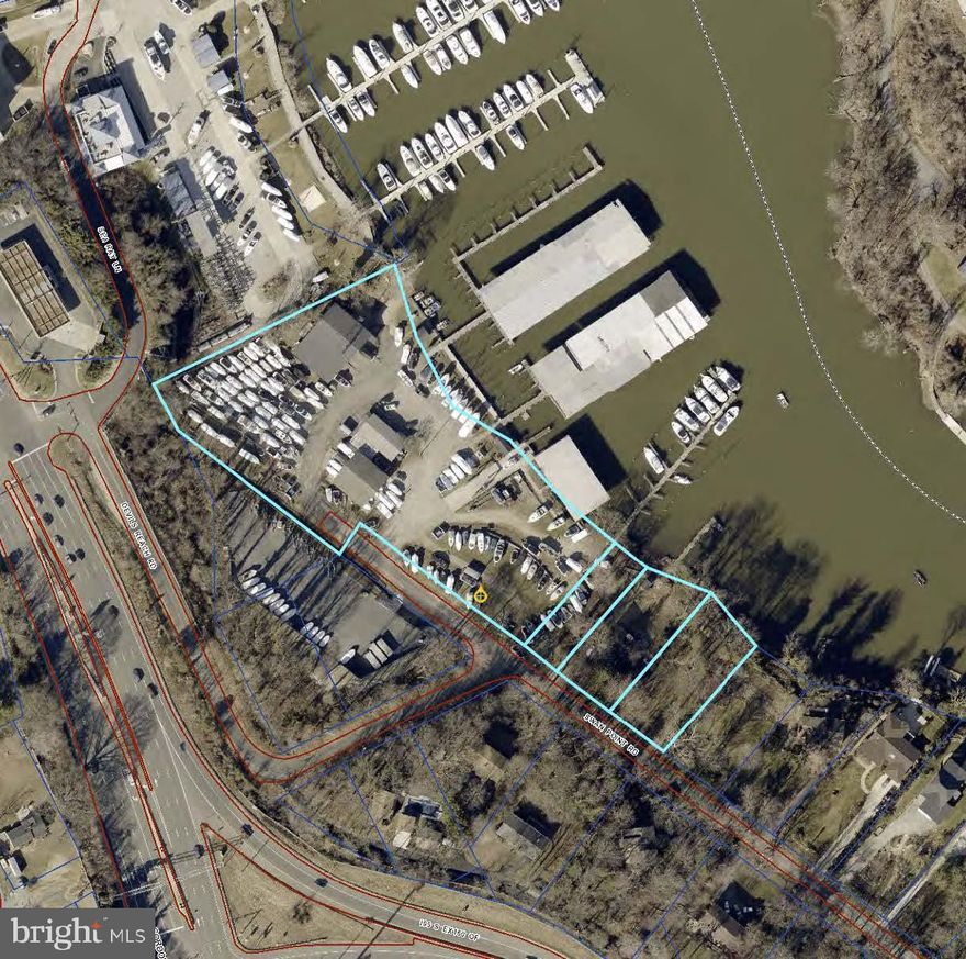 The subject is an existing marina operating as Hoffmaster's Marina which contains a total of
163 rental spaces, which includes 71 uncovered wet slips, 59 covered wet slips, and 33 dry
site storage slips. The site is improved with a ship's store building containing 2,366 rentable
square feet, a sales/ service building containing 4,800 rentable square feet, and various
ancillary improvements. The marina improvements were reportedly originally constructed in
1958 with various renovations over time. The marina is located on two tax parcels which
contain a total of 3.230 acres. In addition to the marina property, the subject also includes a
single-family home on two tax parcels which contain a total of 0.8018-acre. The home
contains 3 bedrooms, 2.0 bathrooms, 2,454 heated square feet (including a finished
basement), and a 2-car detached garage.