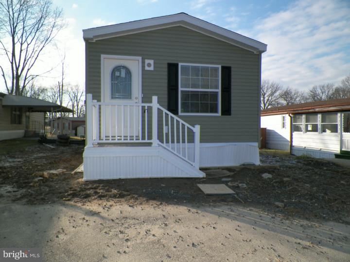 Welcome home! This beautiful new, low maintenance, energy efficient home is ready and waiting just for you. Enter from a front porch into light, bright, living room with cathedral ceiling. Spacious eat-in kitchen has pantry, refrigerator, dishwasher, flat top stove and microwave oven; Main bedroom suite is equipped with a walk-in closet, large bathroom, walk-in shower and ample storage space. The second bedroom and hall bath with tub/shower will easily accommodate your overnight guests. This active adult community provides a broad range of social activities, and is just a short walk away from the club house. Call for your appointment today.