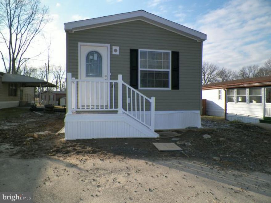 Welcome home! This beautiful new, low maintenance, energy efficient home is ready and waiting just for you. Enter from a front porch into light, bright, living room with cathedral ceiling.  Spacious eat-in kitchen has pantry, refrigerator, dishwasher, flat top stove and microwave oven; Main bedroom suite is equipped with a walk-in closet, large bathroom, walk-in shower and ample storage space. The second bedroom and hall bath with tub/shower will easily accommodate your overnight guests.  This active adult community provides a broad range of social activities, and is just a short walk away from the club house. Call for your appointment today.