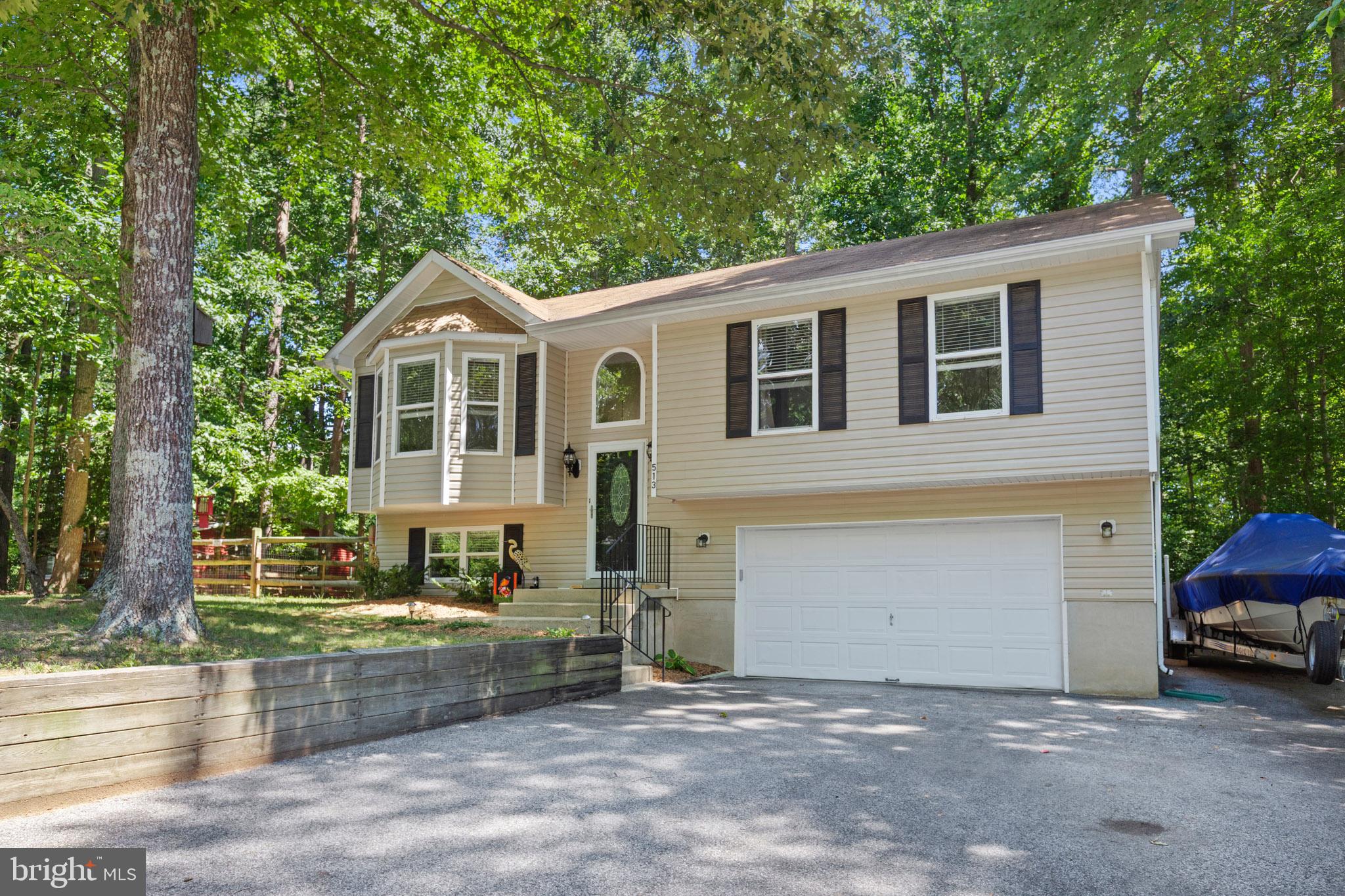 Welcome to this charming 3-bedroom, 2.5-bath home nestled in the sought-after beach community of Chesapeake Ranch Estates, offering private access to sandy beaches, a clubhouse, a serene lake, and multiple playgrounds. This bright and airy split-foyer design boasts abundant natural light, an open layout, and stylish updates throughout. The kitchen features granite countertops, stainless steel appliances, and plenty of cabinet space, perfect for cooking and entertaining. Relax in the spacious living areas or retreat to the comfortable bedrooms, including a primary suite with a private bath. Enjoy peace of mind with a newer HVAC system replaced in 2023 and appreciate the fully fenced backyard with charming split-rail fencing—ideal for pets, play, or simply unwinding outdoors. Whether you’re looking for a full-time residence or a weekend getaway, this home offers the perfect blend of comfort, style, and community amenities.