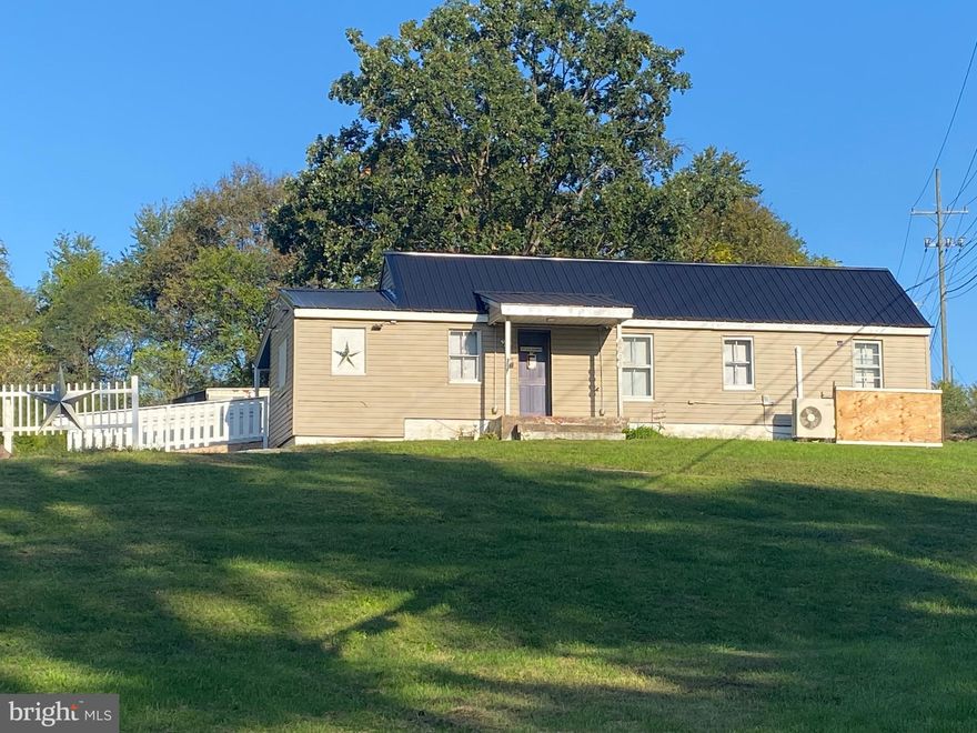 LOOK HERE FIRST! 20K REDUCTION IN PRICE!!!! Sellers are serious they want to sell. You know you have been waiting for the right place to start or grow your own brick and mortar.  Let your imagination go wild. Great location to grow a business and live on location to control costs.  This unrestricted property was used as a store with extra office spaces that can be easily converted back into a residence.  Located outside city limits with plenty of parking space for commercial vehicles and plenty of roadside frontage for advertising.  Detached 24X28 garage with power offers availability to expand the store or use the space for storage /extra rental office potential.  Brand new bathroom, flooring and basement fully sealed and cleaned.  Full video security system in place. The property offers plenty of opportunity to create cash flow.