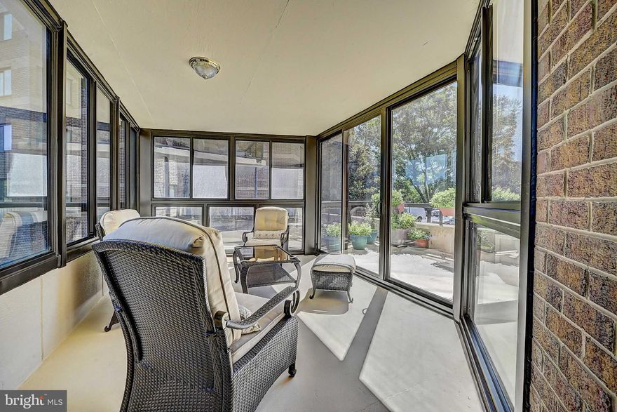 LOCATION, LOCATION, LOCATION! This sun-filled unit is a must-see! Featuring an open floor plan with 1,685 sq. ft. of living space plus a 200 sq. ft. enclosed patio, this home faces east and is bathed in beautiful morning sunlight. The spacious 13' x 9' balcony is perfectly perched among the trees, offering peace, privacy, and a tranquil setting. The kitchen showcases granite countertops, abundant cabinet and counter space, and a large pantry. You’ll appreciate the generous closet space throughout the unit. The primary bedroom is spacious, while the second bedroom includes a Murphy bed and built-in storage units for maximum functionality. The home also features large bathrooms with walk-in showers.
Located directly across from the area's largest Whole Foods, top restaurants, and a movie theater — and just minutes from Tysons Corner! Enjoy outstanding community amenities, including a convenience store, fitness center, yoga studio, four lighted tennis courts, a pickleball court, indoor and outdoor pools, and 24-hour gated security. Perfectly positioned for commuters, with quick access to the Silver Line Metro, Harris Teeter, I-66, I-495, Dulles Airport, and several military installations.