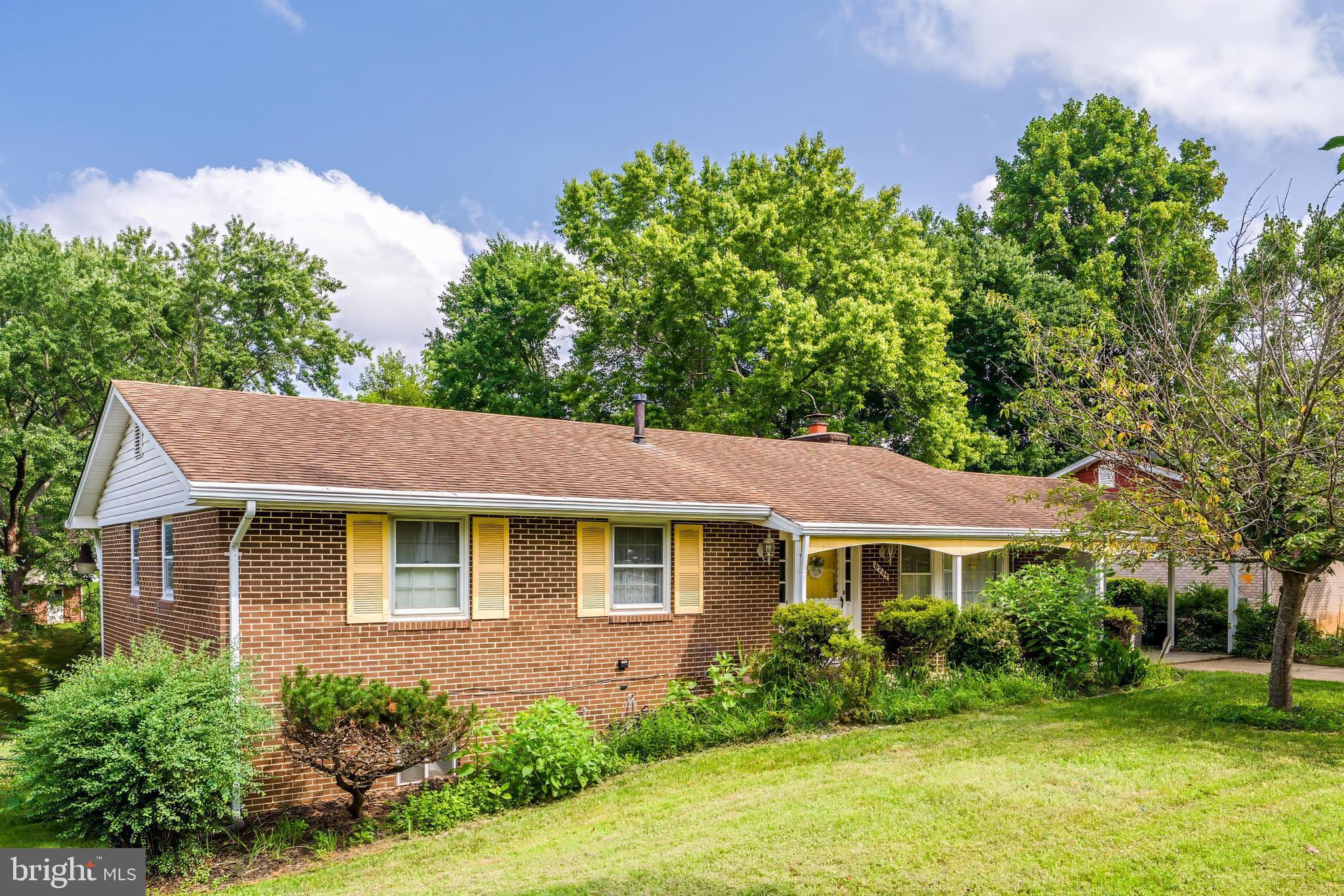 Welcome home to this brick home with all its vintage charm. A large floorplan that can be customized to suit your family needs. SOLD 'AS IS' 3 bedrooms 2 baths on the main level. Original hardwood floors on main level. The kitchen with breakfast area has door to carport.
Stairway from the main level leads to the lower level one bedroom, one bathroom on lower level. Family room with brick fireplace. Lots of storage spaces including large laundry room. Glass sliders opens to large rear backyard
Close to major routes - Rt 5, Rt 15, 495/95 Close to Andrews Airforce Base