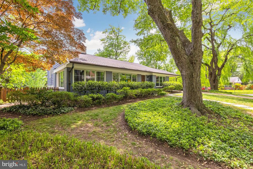 Nestled in the tranquil community of Somerset, this charming mid-century modern home offers suburban serenity and urban convenience, making it an ideal home. As you step inside, you're greeted by a spacious open floor plan featuring a vast living room adorned with soaring ceilings, creating an airy ambiance. Adjacent to the living area, a bonus side den awaits—a versatile space that’s currently being used as a music room, or it could be an additional sitting area, office, playroom, etc. 

The journey continues into the kitchen and dining area, where sunlight streams through numerous windows, illuminating the modern space appointed with bright white cabinetry, stainless steel appliances, and a convenient island. Ascend to the upper level to discover three generously sized bedrooms and two full baths. The primary suite beckons with expansive windows overlooking the backyard, a sleek ensuite bathroom with a standing shower, and a full wall of closets ensuring ample storage. Two additional bedrooms on this level offer comfort and space, complemented by a modern full bathroom featuring a shower/tub combo.

Descending to the lower level unveils a spacious recreational room adorned with a cozy fireplace, offering versatility for leisure or fitness activities. Additionally, this level boasts a bedroom, another full renovated bathroom, and laundry room. Step outside to the expansive backyard oasis featuring a large patio and lush grass area—perfect for outdoor gatherings or serene relaxation.

This home has been meticulously updated and maintained with all bathrooms tastefully renovated within the past decade, alongside significant upgrades including a new HVAC system, roof, water heater, and fresh interior and exterior paint. Further enhancing its appeal, a carport and driveway accommodating 2-3 cars adds convenience and sheltered parking.

Beyond the confines of this charming home, the allure of the neighborhood is calling. Situated on a peaceful block within the coveted Somerset community, residents enjoy access to amenities such as a community swimming pool and proximity to Somerset Elementary School, Westland Middle School, and Bethesda-Chevy Chase High School. With the added convenience of nearby Friendship Heights Metro, upscale retail shops, gourmet dining options, and entertainment venues, this home offers the quintessential suburban lifestyle without compromising on urban conveniences. Schedule a showing today!