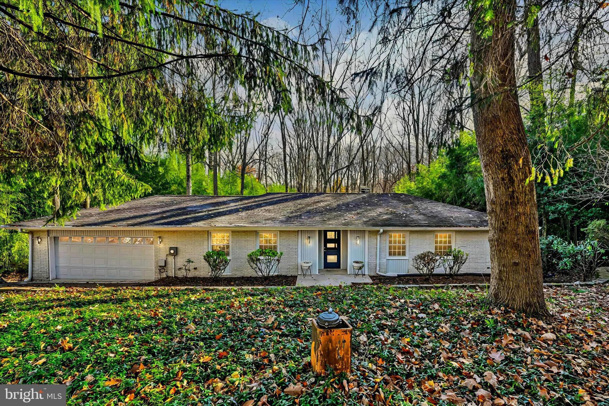 WELCOME TO YOUR PRIVATE OASIS IN THE WOODS
Nestled at the end of a quiet, private court, this stunning home offers the perfect blend of tranquility and convenience. Surrounded by lush trees, you’ll feel like you’re miles away from the hustle and bustle, yet you’re just moments from major roads and shopping.
ENTER AND BE WELCOMED
As you pull into the spacious 2-car garage, you’ll appreciate the convenience of direct access to the kitchen, making unloading groceries a breeze. For guests, the main entry leads into a beautiful foyer, a central hub that connects the entire main floor.
Straight ahead, the sunken living room is the perfect place to unwind, featuring a cozy fireplace and sliding doors that open to the deck—ideal for indoor-outdoor living. The living room flows seamlessly into the open dining area and an updated kitchen designed for the home chef. With ample counter space, stainless steel appliances, and a large, deep sink, this kitchen is as functional as it is stylish.
PERFECT FOR ENTERTAINING
Adjacent to the kitchen is a spacious family room, providing the perfect space to gather. The open layout throughout this level creates an effortless flow for entertaining guests, whether you're hosting a dinner party or a casual get-together.
PRIVATE RETREAT
For privacy, the sleeping quarters are tucked away down a quiet hall. The generous Primary Bedroom features an ensuite bath and double doors that open onto the deck, offering a peaceful view of your wooded lot. Two additional bedrooms share a full bath on this level, providing ample space for family or guests.
EXPANSIVE LOWER LEVEL
The lower level offers even more living space, including a second family room and an additional room that could easily serve as a fourth bedroom, complete with its own ensuite bath. Whether you need a guest suite, office, or extra living area, this space offers flexibility to suit your needs.
Storage is never a problem here, with a huge storage room and a large laundry room providing plenty of space to keep your home organized and clutter-free. Here, you will also find the brand new HVAC system that was just installed coverting the system from oil to an electric Heat Pump
YOUR NATURE-FILLED ESCAPE
Step outside to the deck and lower patio, where you’ll enjoy views of the tree-lined lot that offers ultimate privacy and a serene setting. Surrounded by nature, this is truly your own private retreat.
If you’ve been looking for a home that combines comfort, style, and seclusion, this is the one. Come see your nature-filled private oasis—where the best of both worlds meets.