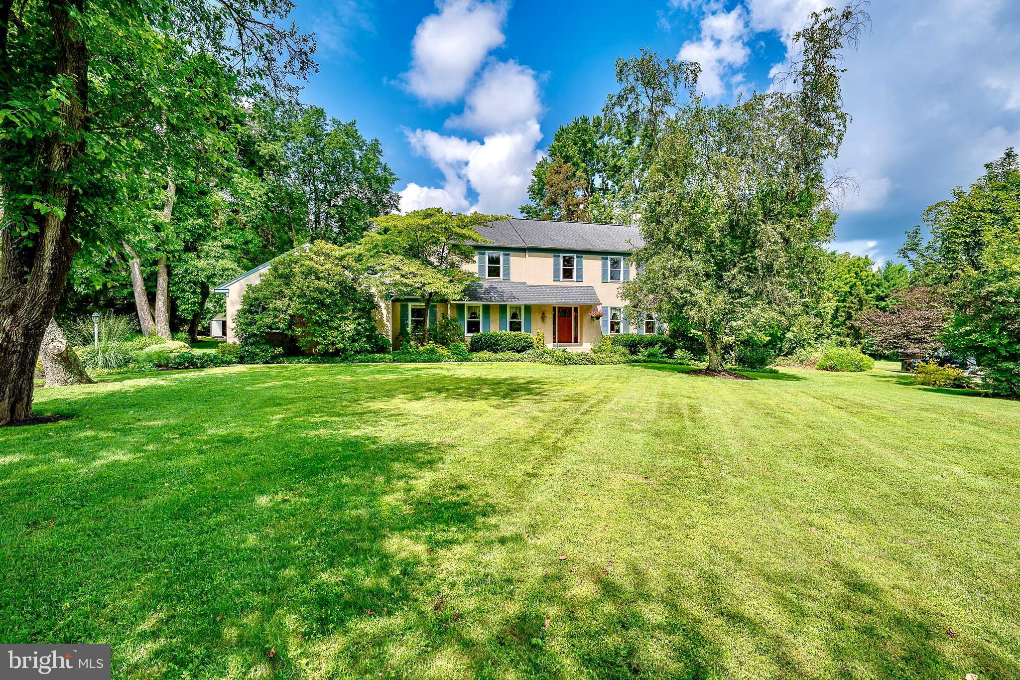 Welcome to 2390 Pineview Drive, a lovely traditional colonial home tucked away on a quiet cul-de-sac in the award-winning T/E School District. This home was the model home for the community, and as such, offers many special features reserved for model homes, especially the stunning 2.3-acre level and open yard, perfect for all outdoor recreation, entertaining or just relaxing in a natural garden oasis. This home has been lovingly updated and maintained, and offers a rare combination of privacy, space, and timeless charm, surrounded by manicured lawn, mature trees, and a park-like setting. Inside, you will find hardwood floors throughout, custom millwork as evidenced in crown molding and chair rails, unique and beautiful leaded glass windows that frame the front door, and a gracious floor plan that includes a formal living room with new lighting, an elegant dining room, and a bright kitchen with breakfast area that opens to a screened porch. The Family Room is just steps away from the kitchen and features a wood burning fireplace for cozy winter evenings. An added bonus is the office which provides a room offering privacy and quiet. The laundry room and Powder Room complete the interior main floor, and the screened porch is a delightful indoor/outdoor living area, enhanced with skylights, that greatly expands the opportunities to enjoy the gardens and beautiful grounds. Continuing on the second floor, all four bedrooms offer abundant natural light, and the primary suite features a walk-in closet and an updated bath. Additional highlights include a two-car garage, large unfinished basement, pull down stairs to partially floored attic, and a separate utility shed with electricity—ideal as a workshop or garden shed. A Kohler whole-house generator provides year-round peace of mind. Located just minutes away Paoli Train Station, Wegmans, Great Valley, and all the shops and dining of the Main Line., this is a rare opportunity to live in a bucolic setting and also enjoy the many benefits of the surrounding communities.