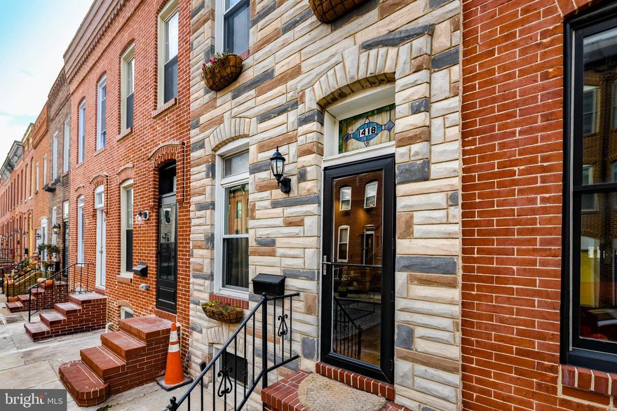 ****Sat, Nov 27 12:00 PM - 1:30 PM***
***Welcome to the Heart of LOCUST POINT! Totally remodeled-stunning and spacious sun-drenched Formstone front home with parking pad boasts a spectacular gourmet kitchen with quartz counters, custom soft-close cabinets, built in refrigerator, stainless steel appliances, gas range, beautiful refinished wood floors, fresh paint, recessed lighting and original exposed brick wall. Perfect blend of the old and new! This absolutely gorgeous remodeled home featuring an open floor plan and two bedroom suites close to everything that Baltimore has to offer.  Upstairs is the primary bedroom suite with a vaulted ceiling, two sunny windows and an en-suite bath. There is a second generously sized bedroom suite with a door to the charming and en-suite bath.  Bonus upstairs level laundry room with shelf to fold laundry on. (no more lugging laundry up two flights of steps)!!!  In the rear is a parking pad offering off-street parking. Plenty of entertainment and restaurants within walking distance, and Latrobe park is nearby for your furry friend! Totally remodeled in the last year. 150K worth  of work completed. All new appliances, electrical and plumbing. Hot water replaced in January 2019, HVAC around 6 years old.