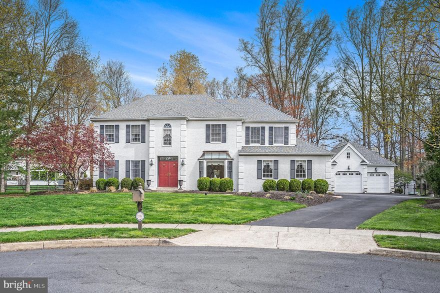 Welcome to 1790 Forest Creek Drive, a stunning 3,400+ square foot residence nestled in the end of a quiet cul-de-sac in Blue Bell. This beautifully maintained 4-bedroom, 2.5-bath home offers timeless elegance, thoughtful upgrades, and an abundance of space both inside and out. From the moment you arrive, you'll appreciate the stately curb appeal and double-door entry that opens to a lovely two-story foyer. Every inch of this home reflects quality craftsmanship - crown molding, chair rails, wainscoting, and detailed trim work throughout set the tone for refined living. To the left, a versatile home office provides a quiet retreat—ideal for working remotely, relaxing with a good book, or creating a cozy library or sitting room. To the right, a formal dining room is anchored by a striking front bay window, perfect for hosting holiday meals or special gatherings. Continue through a small hallway, where you'll find convenient built-in storage for china or pantry items, and step into the heart of the home - the oversized kitchen, designed for both beauty and function. Cherry cabinetry, a custom tile backsplash, an appliance garage, and an island with seating for four make this space a chef’s dream. A sunny breakfast area adds even more room for gathering. Flanking the kitchen is a spacious family room featuring a classic brick gas fireplace, recessed lighting, a wet bar, and a large bay window overlooking the expansive backyard. Just off the kitchen, through a Dutch door, the large mudroom/laundry room provides interior access to the attached 2-car garage. Upstairs, the massive primary suite is your personal retreat, complete with a built-in dressing table and a luxurious ensuite bath featuring a jetted soaking tub and a separate stall shower. Three additional bedrooms and a well-appointed hall bath with dual sinks complete the upper level. The full unfinished basement offers incredible potential for additional living space or abundant storage. Let your imagination run wild—media room, gym, game room, or workshop possibilities abound. Step outside to your own private oasis: a fully fenced backyard with mature trees, a large storage shed, and an elegant paver patio—perfect for entertaining, relaxing, or watching kids and pets play. In addition to the attached 2-car garage, a detached 2-car garage provides even more storage, with loft space above. Set in a picturesque neighborhood just minutes from Routes 202 and 476, this home is a rare find. Don’t miss the opportunity to make it yours—schedule your private tour today!