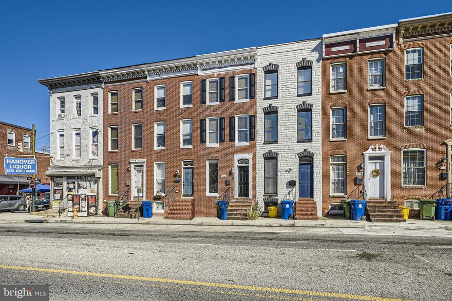 Owner says, Sell it! - $25,000 Price Adjustment! Wow! So much to offer and so many possibilities with this amazing Federal Hill home. Rare 4BD 4BA Home Perfect for Roommates or as a Rental Property. Last rented for $3,200/m. As you enter the home, the main level shows off a beautiful inlaid hardwood floor. The Tray Ceiling is lighted for a stunning accent effect and new paint is throughout the home. Chair molding and exposed brick are the icing on the cake. The open floor plan allows for a dining area and easy access to the large kitchen. Wood cabinets and granite counters offers plenty of space and storage. The kitchen island is perfect for a quick breakfast spot. Off the back French doors swing out into your large private fenced in yard that also houses a storage shed. Heading upstairs you have the master bedroom with its en-suite bath. There is an additional bedroom and another full bath with a jacuzzi soaking tub. Each bath has custom tile work. The upper level can be used as a suite-level with its additional bedroom and full bath. It also has a wet-bar and sitting area that has access to an upper deck that spans the length of the roof for extra outdoor space - a perfect area for outdoor gardening and relaxing.  Wrapping things up the basement has the 4th bedroom and bath along with a laundry and storage room. The home is move-in ready so schedule your tour today and come experience this amazing property! Love it or leave it with our 12-month ‘Buy it Back or Sell it for Free’ guarantee!* Do you have a home to sell? Buy this home and we will buy yours for cash!* Schedule a tour right now!