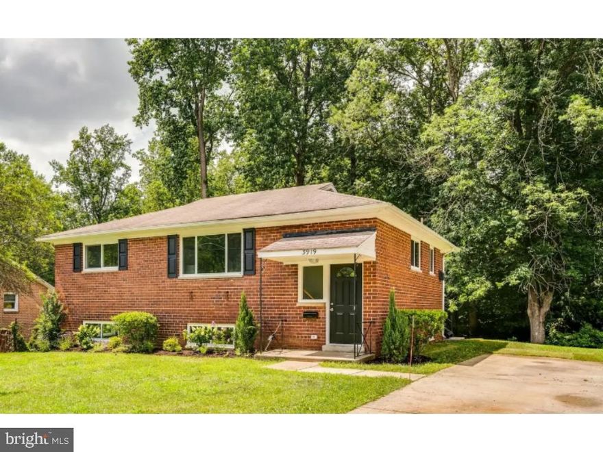 Stunningly Renovated Home Backing to Over 100 Acres of Parkland
This beautifully updated rental home offers modern finishes, exceptional outdoor access, and an unbeatable location directly adjacent to more than 100 acres of protected parkland. Just steps from the paved Matthew Henson Trail—with connections to Rock Creek Trail and commuter routes into Washington, D.C.—this property provides the perfect blend of nature and convenience.

The main level features refinished hardwood floors, a bright living room with recessed lighting and a large picture window, an adjacent dining area, and three spacious bedrooms with a brand-new full bathroom. The newly renovated kitchen includes white shaker cabinetry, quartz countertops, stainless steel appliances (including gas cooking), under-cabinet lighting, ceramic tile flooring, and direct access to the backyard and patio.

The light-filled lower level offers a large family room, a fourth bedroom with two closets, a brand-new full bathroom, and a separate laundry/storage room. A private rear entrance leads to an expansive patio—ideal for outdoor entertaining.

Additional upgrades include new lighting throughout, updated electrical switches and outlets, new water lines, new wall-to-wall carpet on the lower level, a new backyard retaining wall, freshly cleaned air ducts, and a professionally maintained roof. A two-car driveway provides convenient off-street parking.

Located just minutes from shopping, schools, and major commuter routes, this home delivers a rare opportunity to enjoy a fully updated interior in a peaceful, park-like setting with direct trail access at your doorstep.