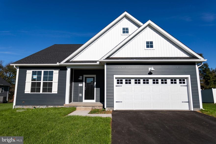 Huge price reduction, won't last long!  A Ranch Style home which gives you a convenient lifestyle with everything you need on one floor with luxury features, comfort, and value! Let us introduce you to our timeless designed rancher with an open concept floorplan, highlighting a beautiful bright kitchen with a spacious 5’ island for lots of room for extra counterspace and entertaining.   A large great room is welcoming off the kitchen area.  The owner’s suite includes a beautiful cathedral ceiling, with a large bathroom and walk in closet! The community is just minutes away from local shopping and dining, and a short commute to many major cities!