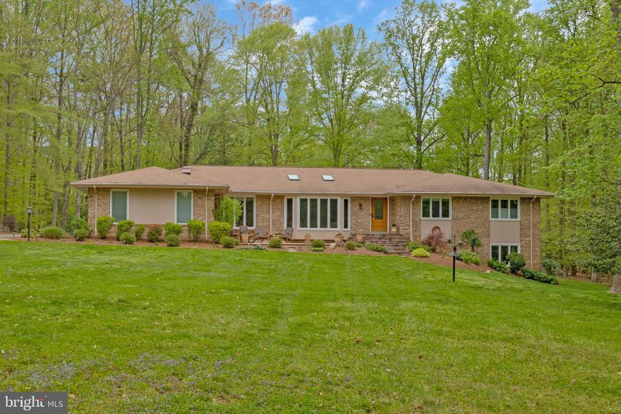 Enjoy one-level living with flowing spaces on a quiet street amidst towering hardwoods and lushly landscaped grounds, with a sparkling pool as the centerpiece!  Welcome to this lovingly maintained and enhanced contemporary on two beautiful acres.  Modern yet warm, this spacious residence has been expanded and updated with high quality materials and design elements throughout.  You will enjoy the vaulted ceilings, skylights, wall of built-ins, the expansive kitchen adjoining the family room, and elegant renovated bathrooms.  The chef-caliber kitchen is designed for cooking and entertaining.  Walls of windows bring the outside in and offer abundant interior light.  On the main floor you will find two large ensuite bedrooms and an office that can also be utilized as a third bedroom.  The lower level provides every feature needed and desired:   walk-out doors to the pool, full bathroom, another bedroom with ample natural light, huge rec room, and tons of storage space  The home boasts a 3-car garage, large deck, and patio adjacent to the pool, and a lovely front patio.  Sited on a grassy knoll bounded by nature, this country escape is conveniently located for today's lifestyle, yet features the quietude and beauty of the changing seasons.  Lease includes lawn care and professional opening/closing of pool.  Property is also for sale (VAFX2176046).