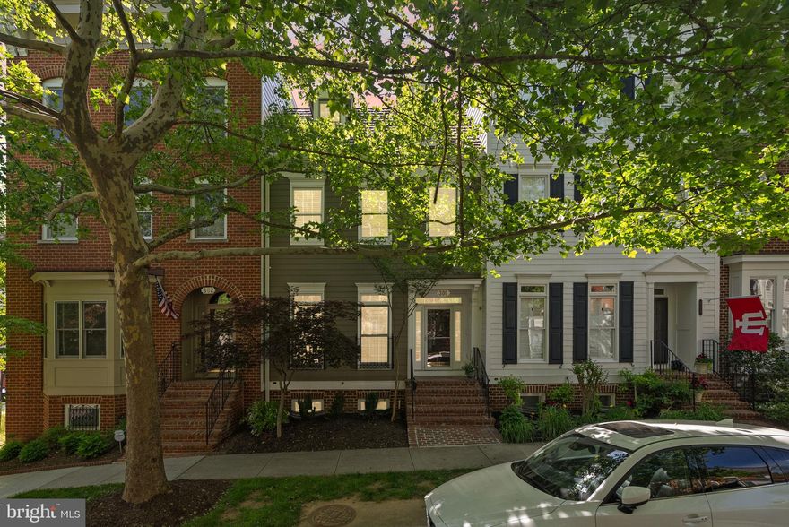 Welcome to 306 Hart Road -- a beautifully updated townhome nestled in the heart of the Kentlands Midtown. This spacious 3-level residence offers 3 bedrooms, den, 3 full and 1 half baths and thoughtfully designed living spaces filled with natural light. Soaring 10 ft ceilings, hardwood flooring, extensive moldings and oversized windows with plantation shutters create a warm yet sophisticated feel throughout the main level.


The expansive living and dining spaces are anchored by a dramatic double-sided fireplace, and flow effortlessly into the updated kitchen featuring white cabinetry, granite countertops, stainless steel appliances, gas cooking, subway tile backsplash and a sunny breakfast area with direct access to the private deck complete with a retractable awning -- ideal for outdoor dining or relaxing evenings at home.


Upstairs, the spacious primary suite offers hardwood floors, a walk-in closet, a private balcony and a beautifully renovated spa-inspired bath complete with dual sinks, a freestanding soaking tub, oversized glass shower with teak bench and floor-to-ceiling marble-inspired tile. Two additional bedrooms, a renovated bath and laundry complete the upper level.


The finished lower level offers an expansive recreation room with a second fireplace, updated bath and endless versatility for entertaining, movie nights, a home gym, office or guest retreat.


Outside, enjoy a private, low-maintenance courtyard connecting the home to the detached two-car garage - a rare and functional outdoor space that adds both charm and convenience.


Located literal minutes from everything - your favorite restuarants, shops, grocery stores - not to mention three lakes, parks, trails and the Kentlands Clubhouse and Pool!