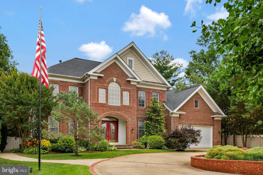 Looking for an impressive home that fulfills your entire wish list? This is it. Five impressive bedrooms, two home offices, and ample parking for 5+ vehicles, plus a level 2 electric car charger inside the two-car garage. This property will exceed your expectations. A grand two-story entryway adorned with an ornate curved staircase sets the tone for this elegant home. The entire home is thoughtfully designed to accommodate your every need. TWO home offices, one with its own entrance, provide the perfect setup for remote work or running your business from home. The main level features one home office, a formal dining room, and multiple living areas, including a casual living space and a formal living room. The main level has versatile options for entertaining guests or spending quality time at home. The chef's kitchen is a true masterpiece, featuring top-of-the-line appliances, high-end finishes, and ample counter space, making it a haven for culinary enthusiasts. Step outside onto the Trex deck, overlooking a meticulously landscaped yard that sets the stage for enjoyable outdoor entertaining and relaxation. The upper level of this residence hosts four bedrooms, two of which feature en-suite baths, providing convenience and privacy for family members or guests. The impressive primary suite is a retreat within itself, showcasing his and her closets and a newly remodeled spa-like bath. Indulge in the double vanity, soaking tub, and oversized luxury shower for the ultimate relaxation experience. The lower level of the home offers a versatile space, perfect for an in-law or au pair suite. Additionally, you'll find a fully equipped luxury home office, a gym or recreational area, and abundant storage space. Don't miss the opportunity to make this extraordinary property your own. Schedule a showing today and experience the epitome of luxury living.