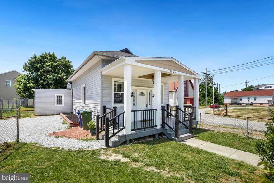 Welcome to a charming, tastefully decorated rancher in an excellent location. This beautifully remodeled home features a modern open  kitchen layout with new cabinets, a stunning quartz countertop, new floor tiles. The remodeled bathroom adds a fresh  touch. Enjoy the spacious yard for outdoor activities, along with ample off-street parking. Relax on the expansive front and back porches, ideal for socializing or unwinding. The house sits on a double lot, offering additional space and a sense of privacy.  Minute walk to the park that you can see right from your backyard. Don't miss out on this delightful rancher that combines style, convenience, and a desirable location. Schedule a showing today to explore the charm and possibilities it holds.