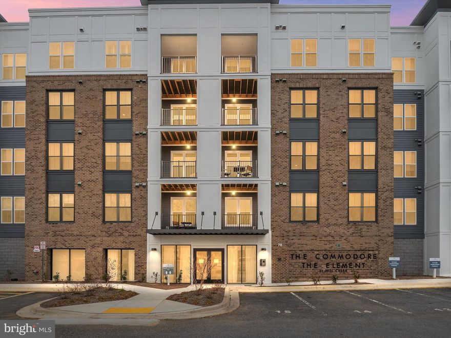 Modern Luxury Meets Active Living at The Element! Welcome to this newly built active-adult (one resident must be 55+ years old) community designed for resort-style living just minutes from historic Annapolis. This ultra-spacious 2-bedroom, 2-full-bath residence offers the perfect blend of elegance, comfort, and convenience. Step inside to discover a luxury owner's suite featuring an oversized walk-in closet, a spa-like bath retreat, and a private balcony overlooking the serene forest retention area—your personal oasis for relaxation. The designer kitchen showcases a custom backsplash, upgraded appliances, and enhanced lighting, seamlessly flowing into the open-concept living and dining area. Enjoy reserved parking and a variety of resort-style amenities—from pickleball courts and a dog park to a golf simulator and social lounges. Whether you're staying active on the walking trails or enjoying an al-fresco meal with neighbors, The Element provides an unparalleled lifestyle in Greater Annapolis. Live close to everything you need, with effortless access to the Annapolis area's waterfront dining, shopping, and cultural attractions.
