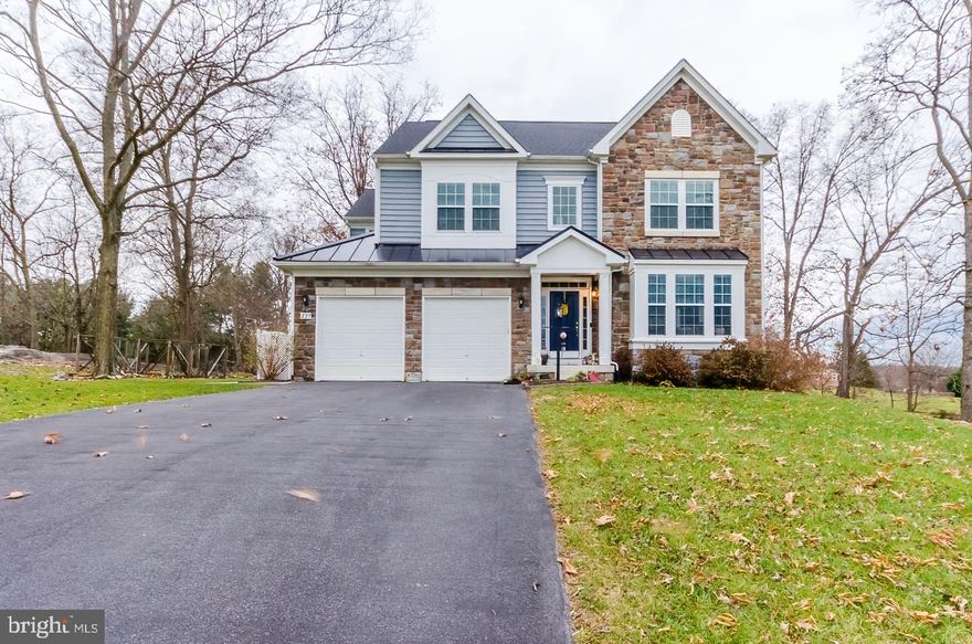 The Belmont model by Dan Ryan Builders sited in a small community on a cul de sac lot backing to wooded areas. This home is move in ready with all the upgrades including hardwood floors on most of main level, upgraded kitchen counters, appliances, island, breakfast area, abuts family room with full stone gas fireplace, opens to rear maintenance free decking and fencing, garden space, 2 car attached garage, full partially finished basement with outside rear entry. Four BRs, 3.5 baths, formal living and dining, neutral interior paint. What are you waiting for. This one checks all the boxes!